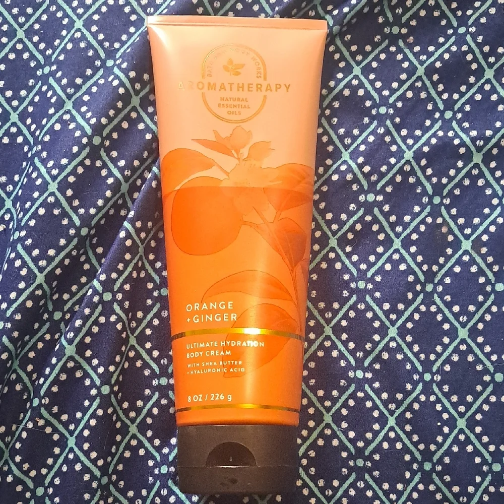 Therapy Orange and Brown Moisturizer and Body Oil - Picture 1 of 1